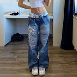 Low-rise straight-leg jeans with heart print, washed denim